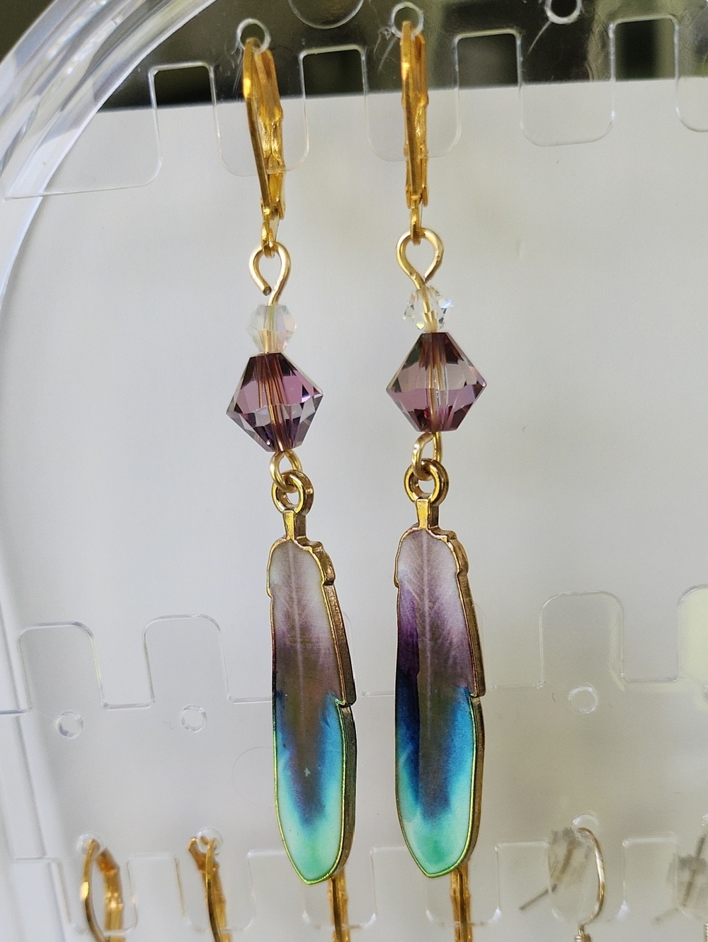 Gold-Tone Feather Drop Earrings with Blue and Purple Hues!